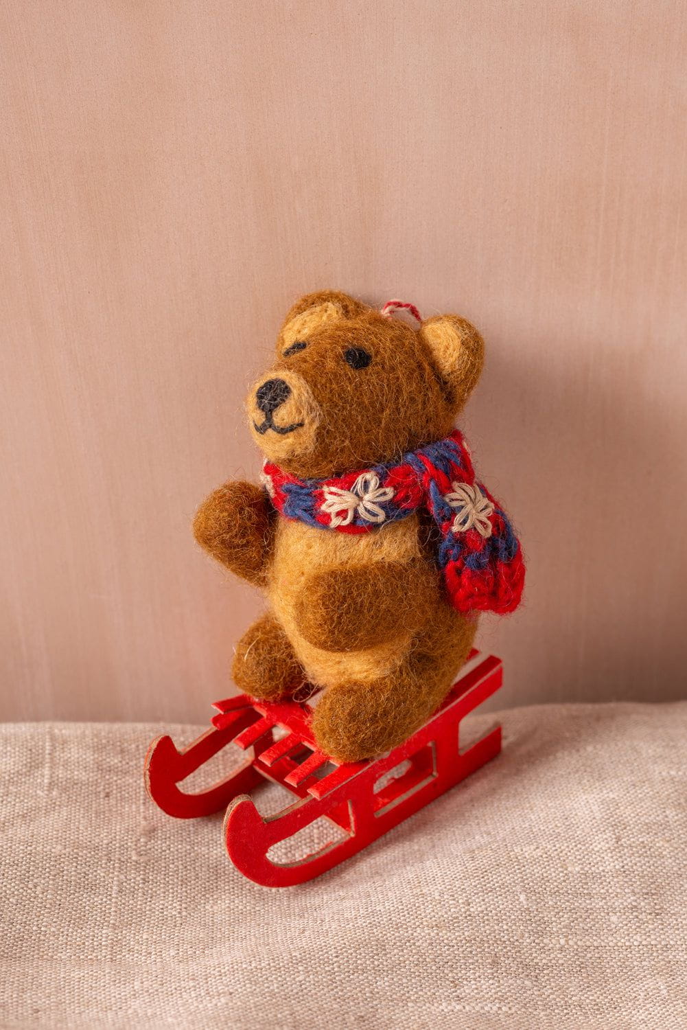 Ian Snow Ltd Felt Bear on a Sled Decoration